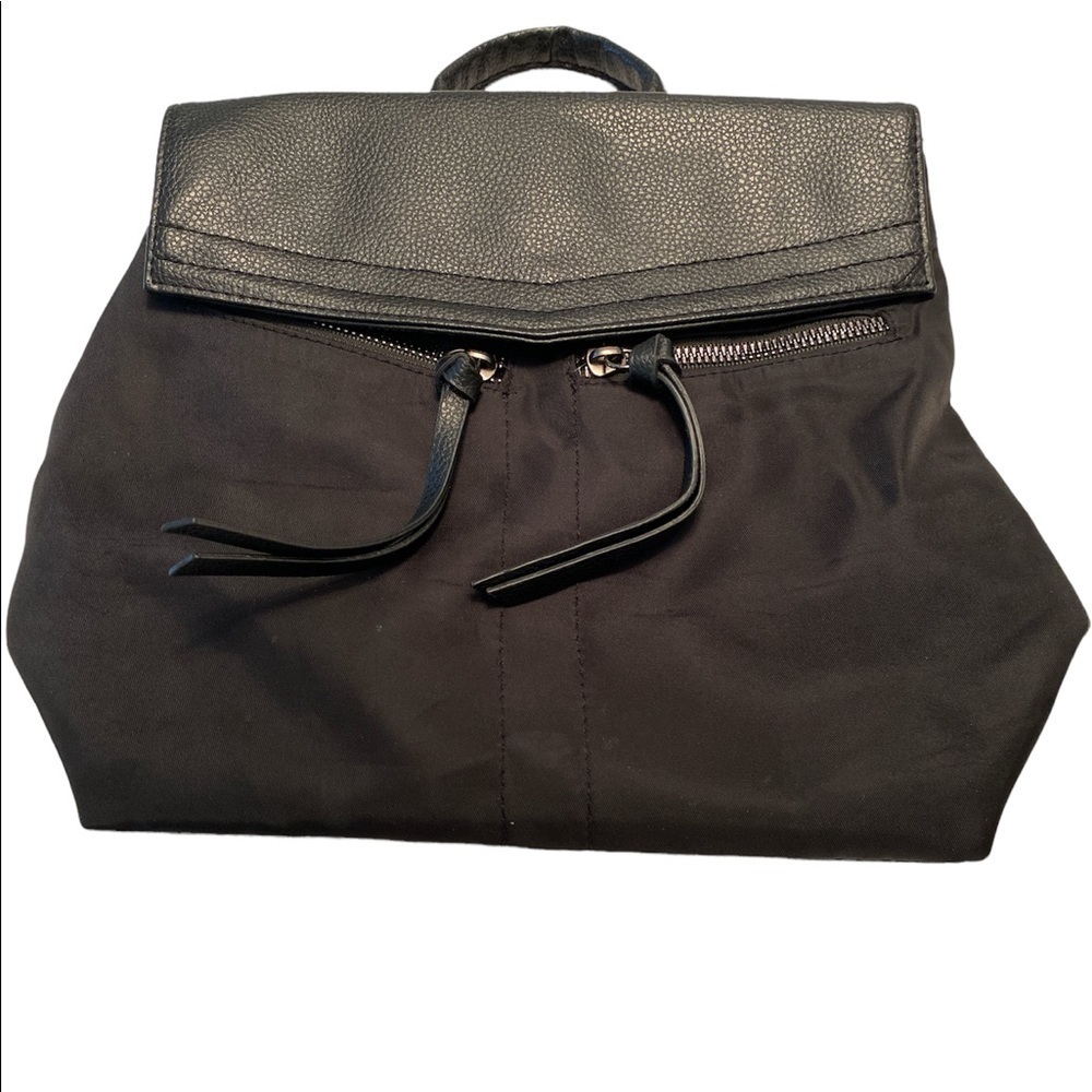 Botkier purse small backpack style adjustable straps magnetic closure
